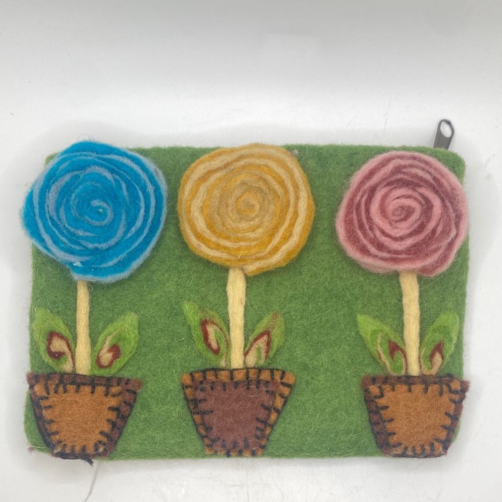 Rising Tide clutch bag handmade, felted wool pouch featuring a floral design
